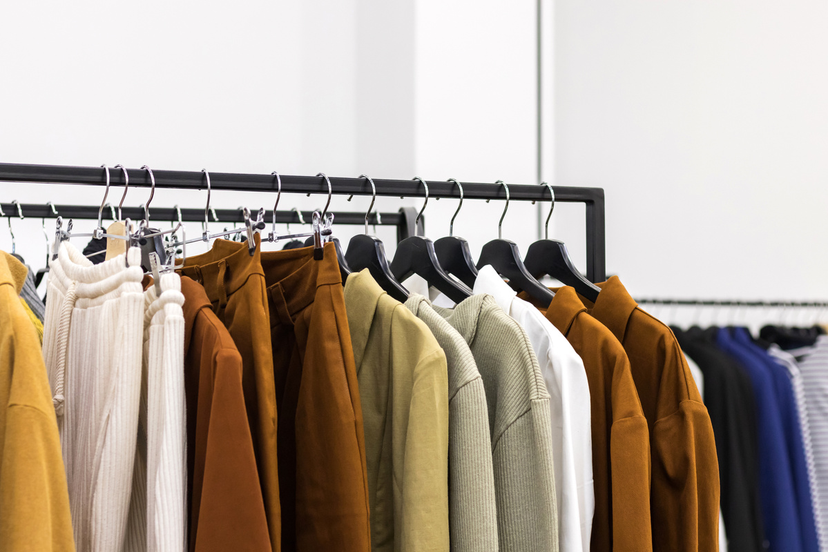 Fashion luxury elegance clothes on the display shop. Fast fashion, mindfulness consumering
